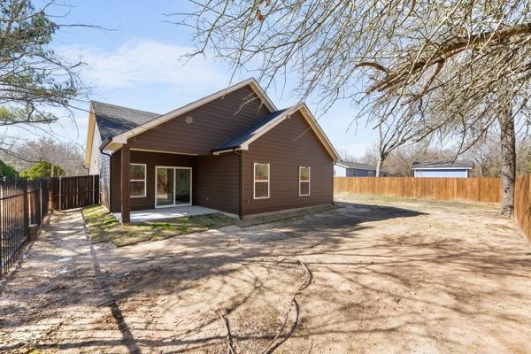 508 Luzon Street Tool, TX 75143 - Photo 34 of 40 a view of a house with snow on the road