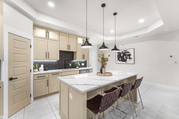 508 Luzon Street Tool, TX 75143 - Photo 10 of 40 a kitchen with a sink a stove a table and chairs