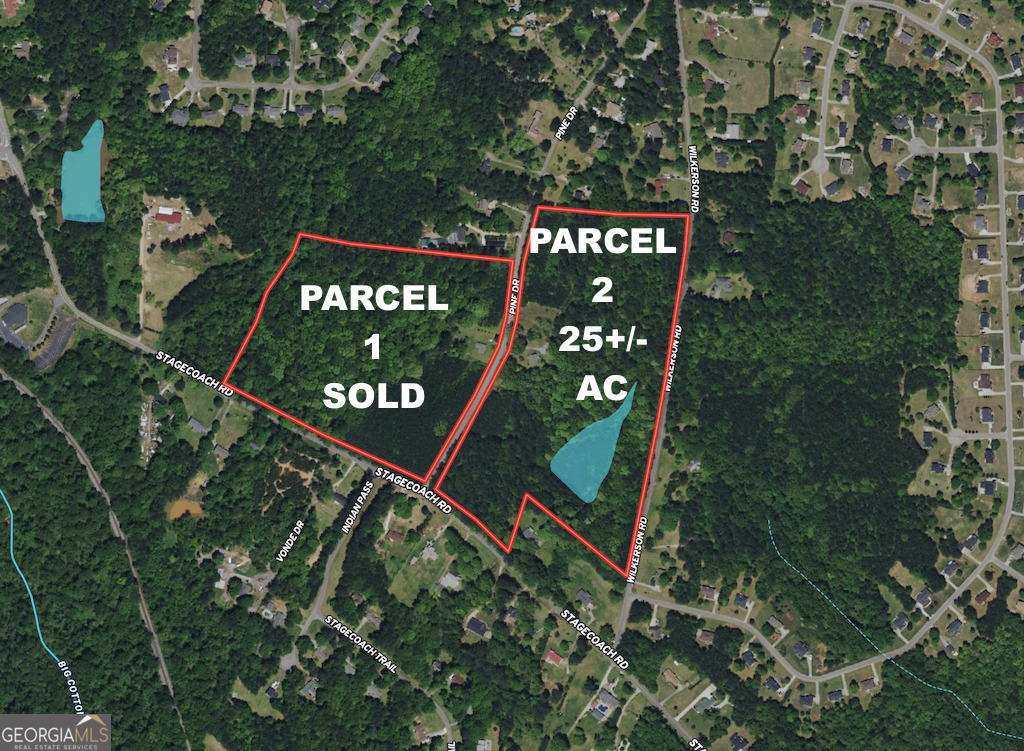 a sign on the street of a park