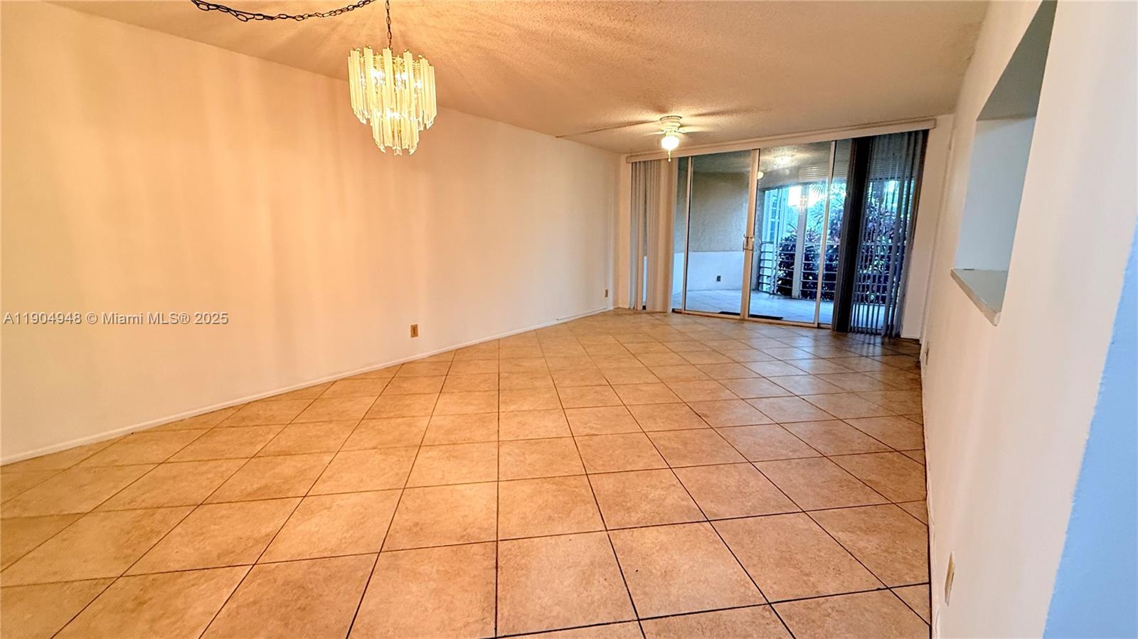 1811 Sabal Palm Drive, Unit 208 Davie, FL 33324 - Photo 26 of 28 a view of empty room