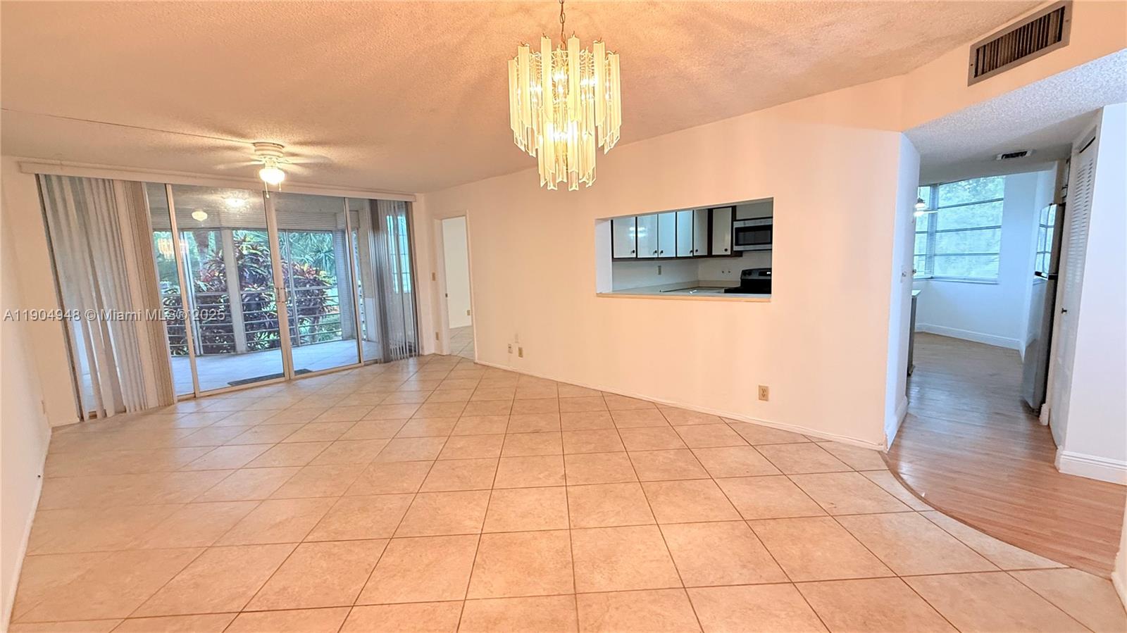 1811 Sabal Palm Drive, Unit 208 Davie, FL 33324 - Photo 28 of 28 a view of an empty room with a window