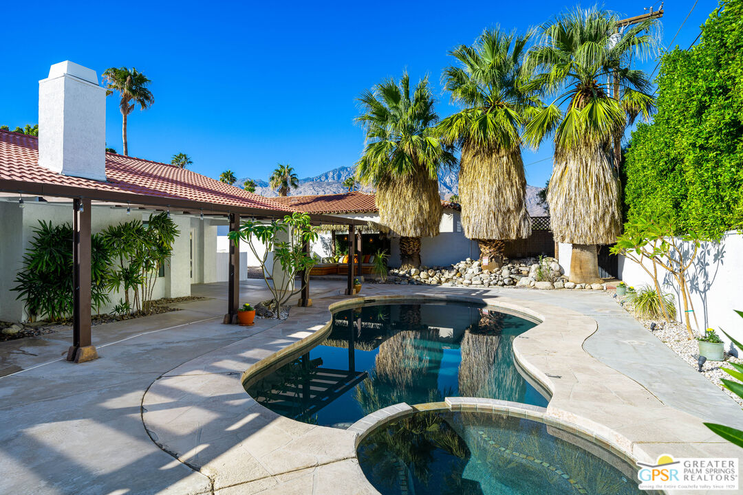 2750 East Vincentia Road Palm Springs, CA 92262 - Photo 40 of 55 a view of a couches and dinning table in patio