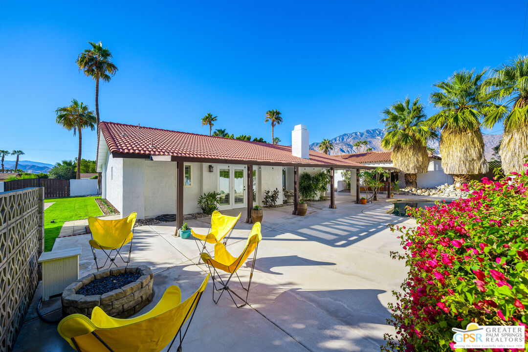 2750 East Vincentia Road Palm Springs, CA 92262 - Photo 44 of 55 a view of a swimming pool with a patio