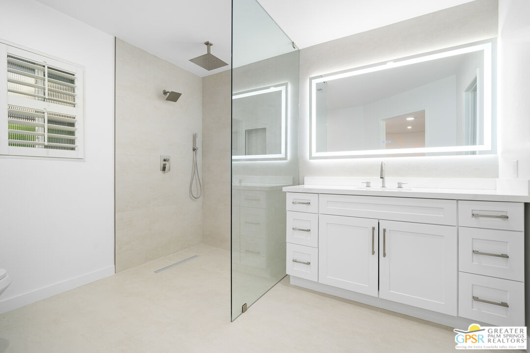 2750 East Vincentia Road Palm Springs, CA 92262 - Photo 49 of 55 a bathroom with a sink and a mirror