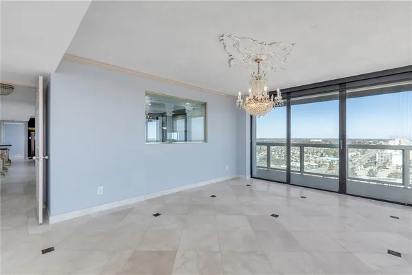 a kitchen with granite countertop cabinets stainless steel appliances and a counter space