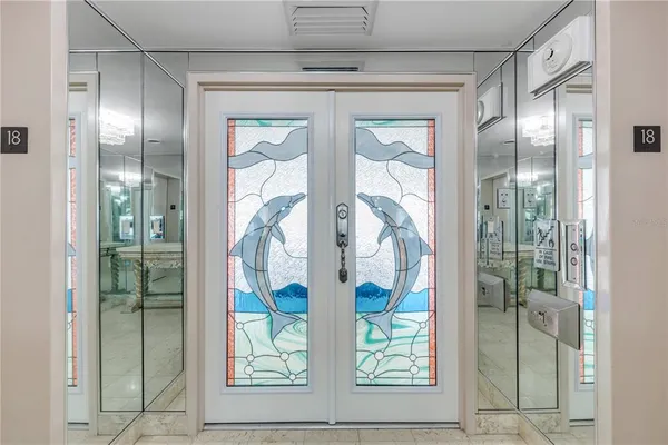 a view of an empty room with windows