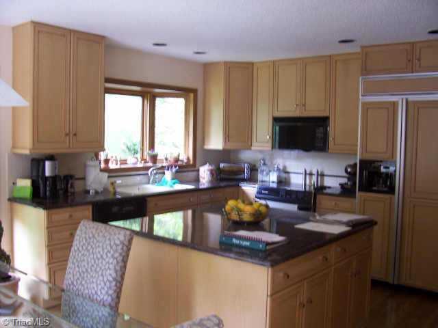 8115 Hunting Cog Road Oak Ridge, NC 27310 - Photo 7 of 8 Other. Kitchen