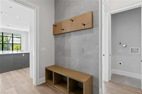 a bathroom with a sink toilet and vanity