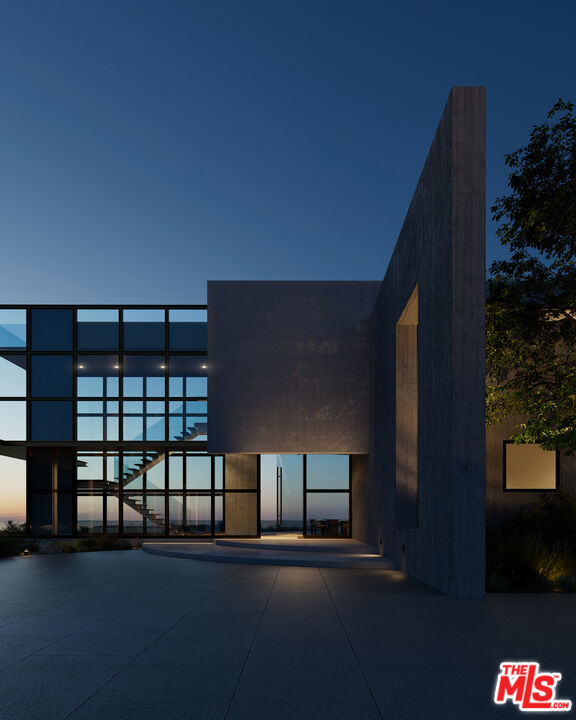 3030 Encinal Canyon Road Malibu, CA 90265 - Photo 4 of 22 a front view of a house with stairs