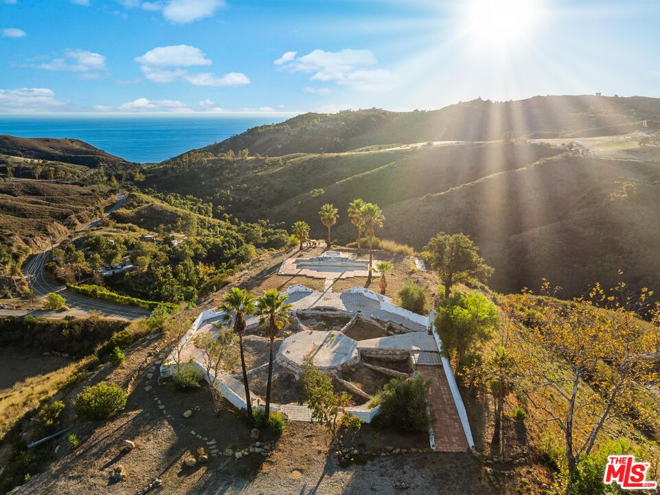 3030 Encinal Canyon Road Malibu, CA 90265 - Photo 6 of 22 a view of a lake with a mountain