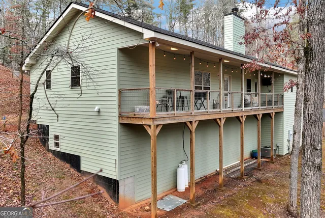 a view of a swimming pool with a yard