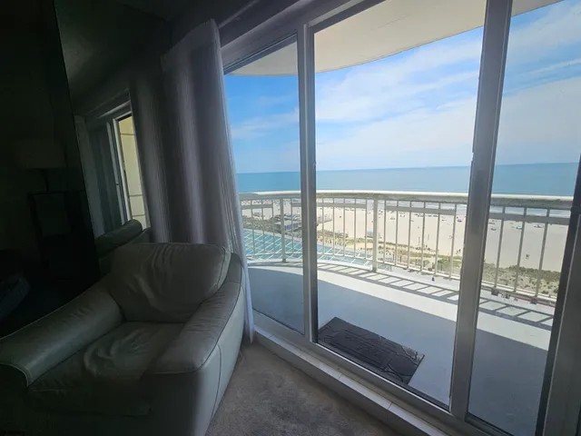 a kitchen with granite countertop a sink and a stove top oven