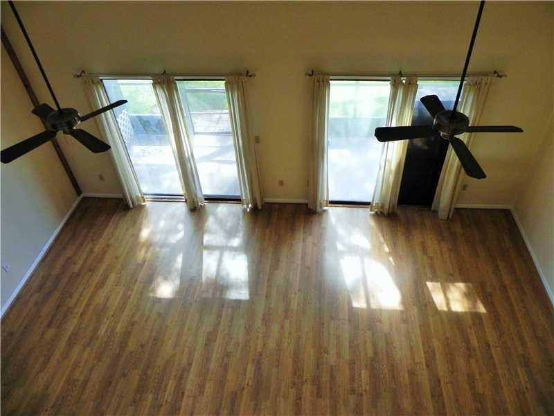 4183 Southwest 87th Terrace, Unit 4183 Davie, FL 33328 - Photo 13 of 34 a view of entryway with wooden floor
