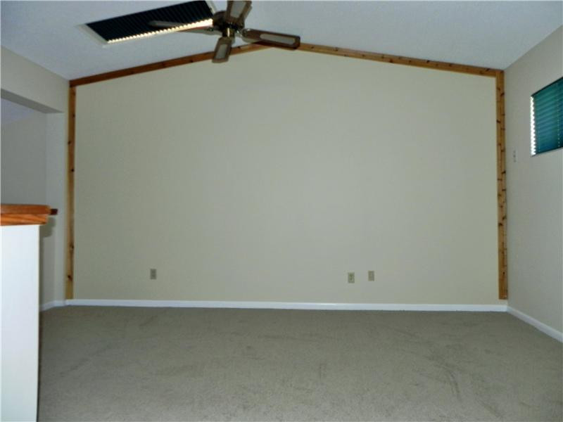 4183 Southwest 87th Terrace, Unit 4183 Davie, FL 33328 - Photo 20 of 34 an empty room with a workbench