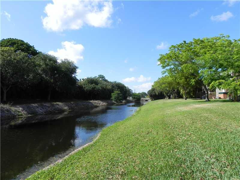 4183 Southwest 87th Terrace, Unit 4183 Davie, FL 33328 - Photo 28 of 34 a view of a garden