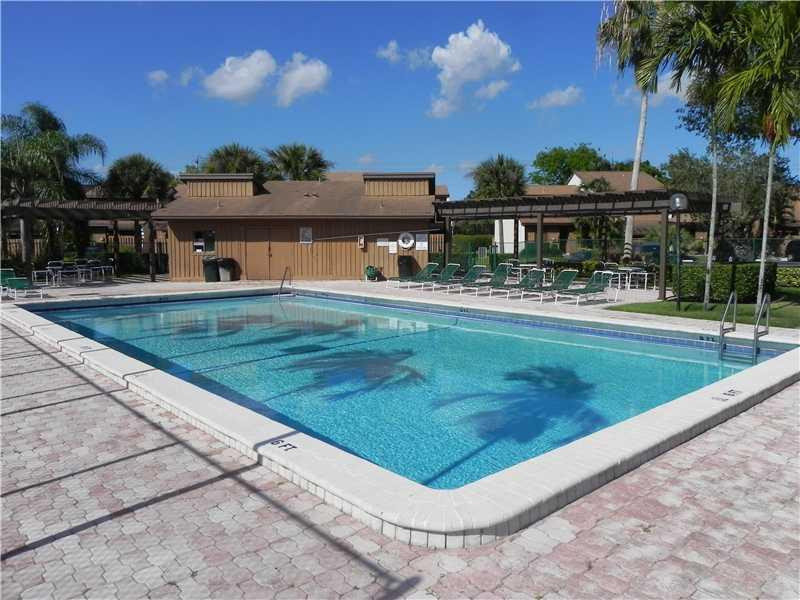 4183 Southwest 87th Terrace, Unit 4183 Davie, FL 33328 - Photo 32 of 34 a view of a house with a yard