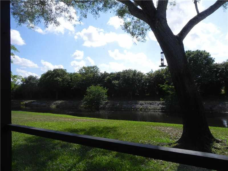 4183 Southwest 87th Terrace, Unit 4183 Davie, FL 33328 - Photo 8 of 34 a view of outdoor space and yard