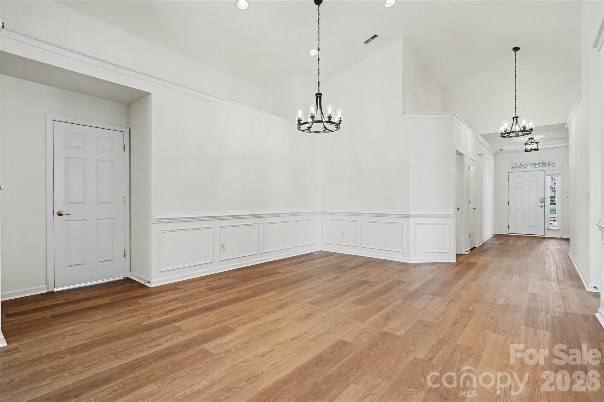977 Platinum Drive Fort Mill, SC 29708 - Photo 11 of 41 a view of a room with wooden floor and a ceiling fan