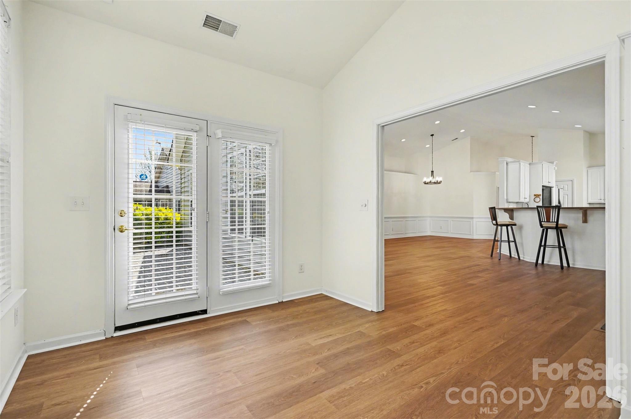 977 Platinum Drive Fort Mill, SC 29708 - Photo 17 of 41 a view of kitchen with furniture and wooden floor