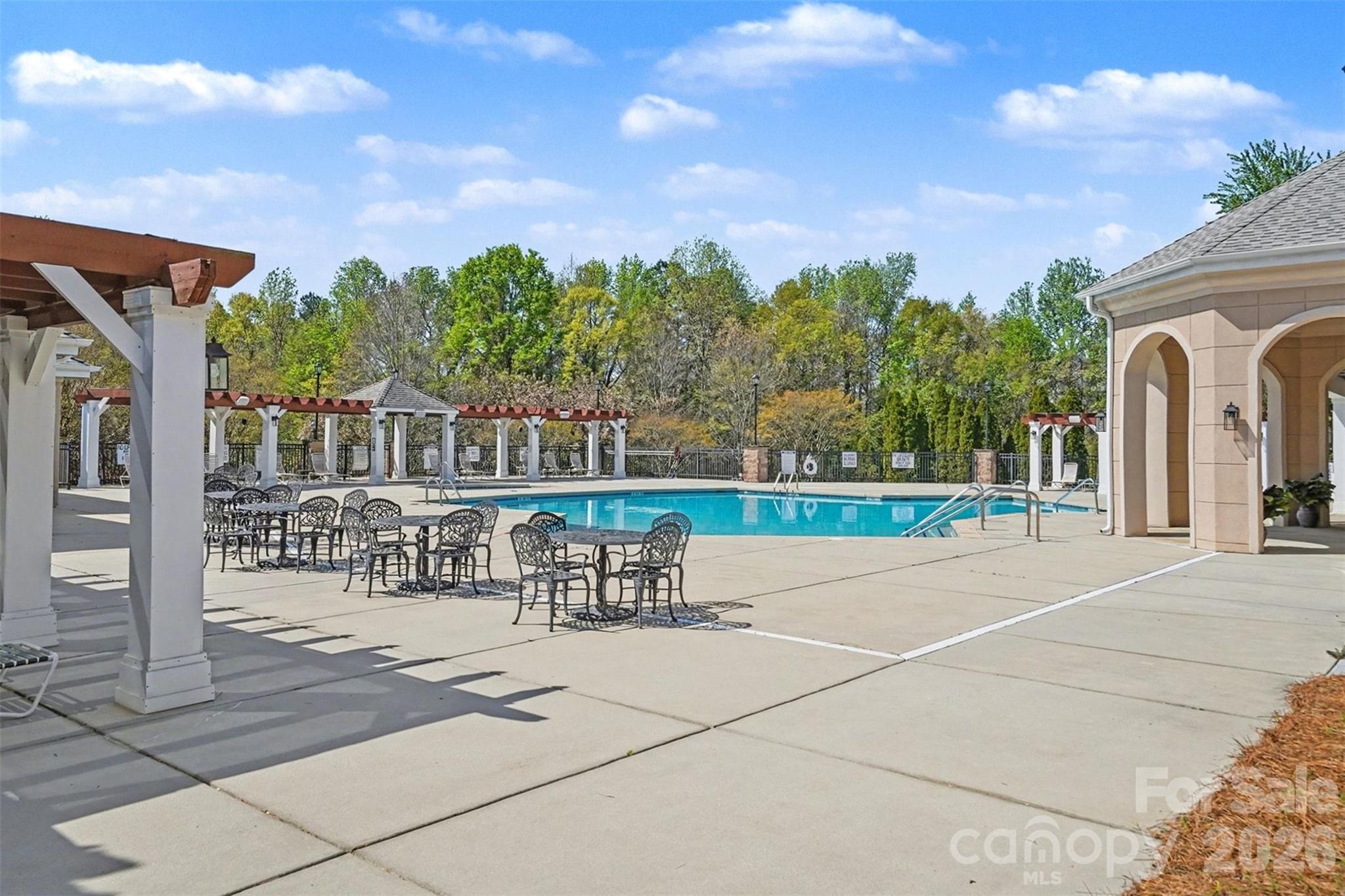 977 Platinum Drive Fort Mill, SC 29708 - Photo 38 of 41 a view of a patio with a table and chairs