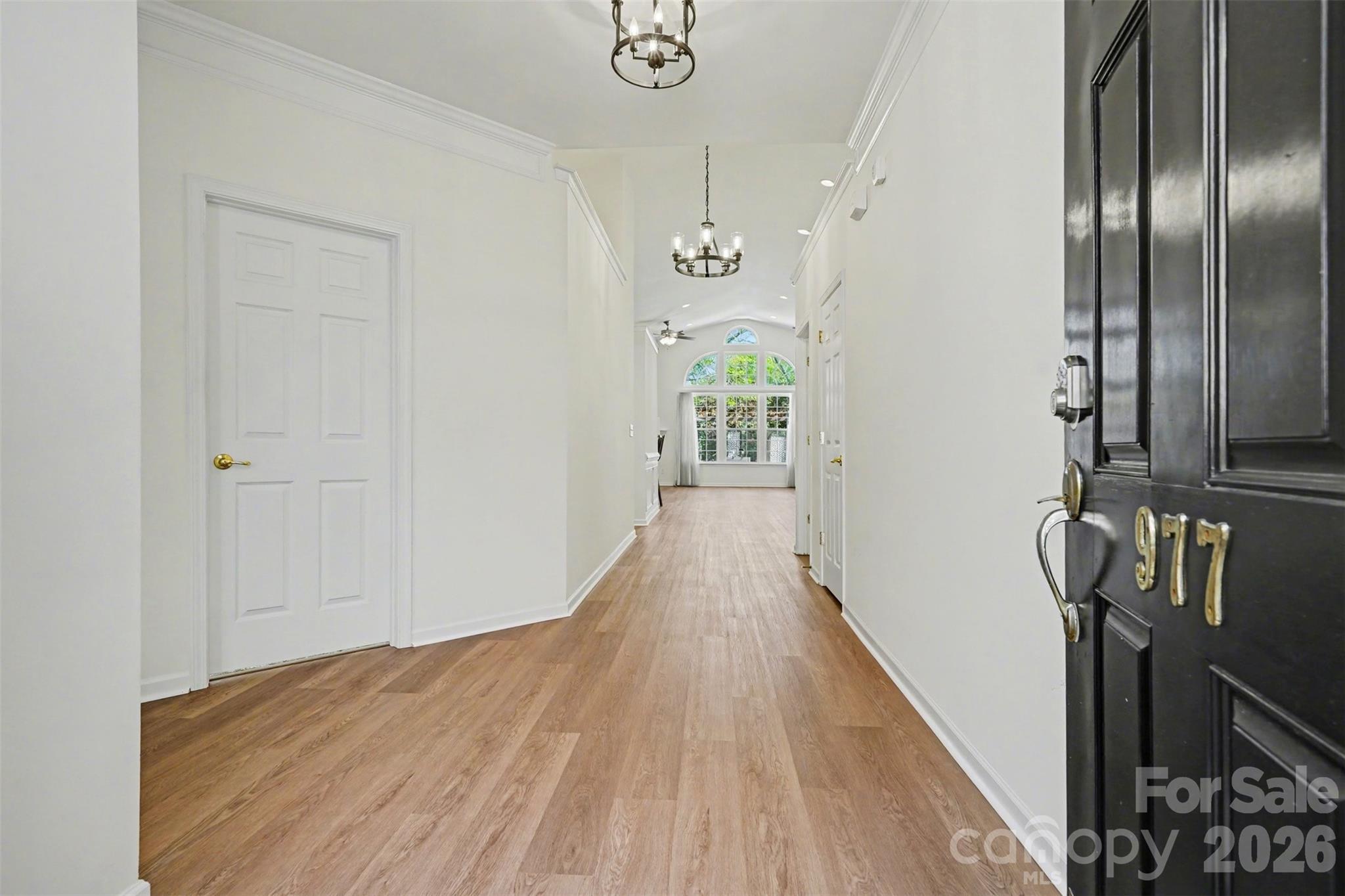 977 Platinum Drive Fort Mill, SC 29708 - Photo 5 of 41 a view of a hallway with wooden floor