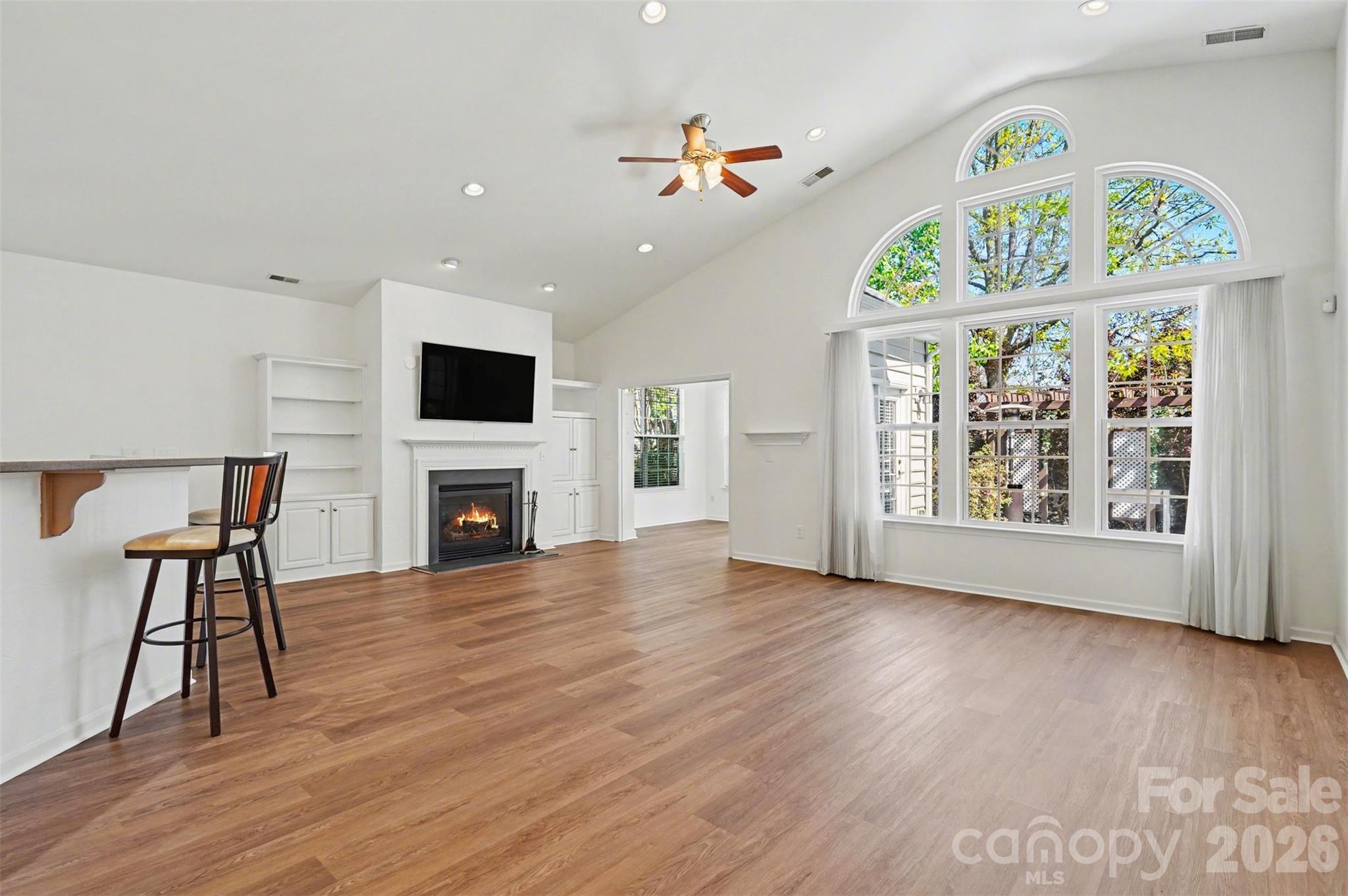 977 Platinum Drive Fort Mill, SC 29708 - Photo 7 of 41 a view of an empty room with a fireplace and a window
