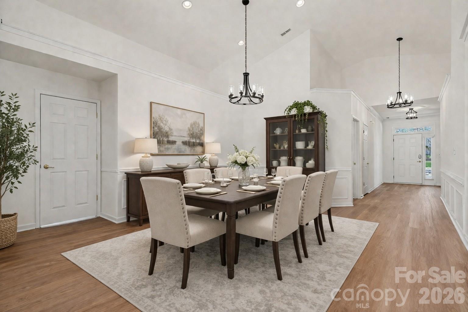 977 Platinum Drive Fort Mill, SC 29708 - Photo 10 of 41 a view of a dining room with furniture wooden floor and chandelier