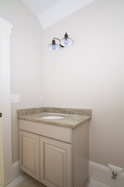 27 Birch Road Littleton, MA 01460 - Photo 17 of 22 a utility room with a sink
