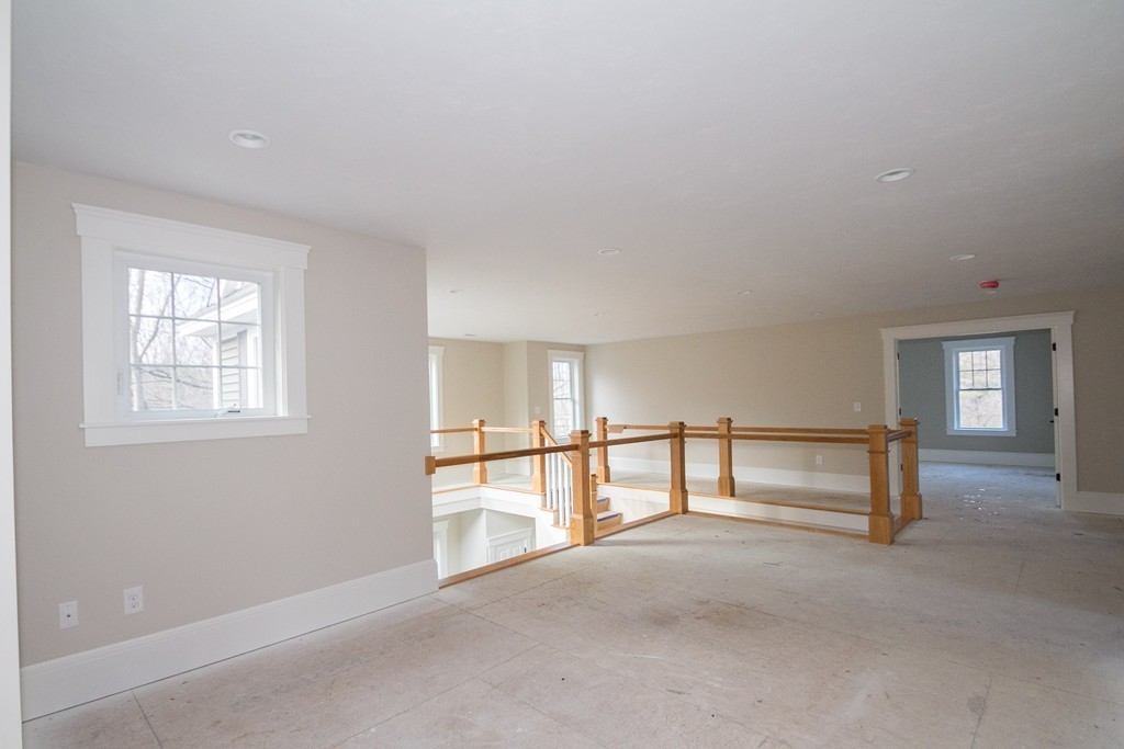 27 Birch Road Littleton, MA 01460 - Photo 18 of 22 a view of an empty room with a window