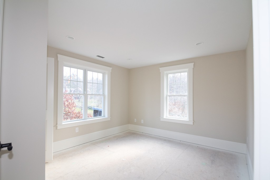 27 Birch Road Littleton, MA 01460 - Photo 22 of 22 an empty room with a window