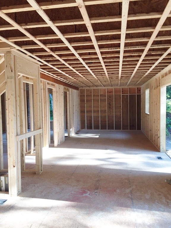 27 Birch Road Littleton, MA 01460 - Photo 5 of 22 a view of a room with wooden walls