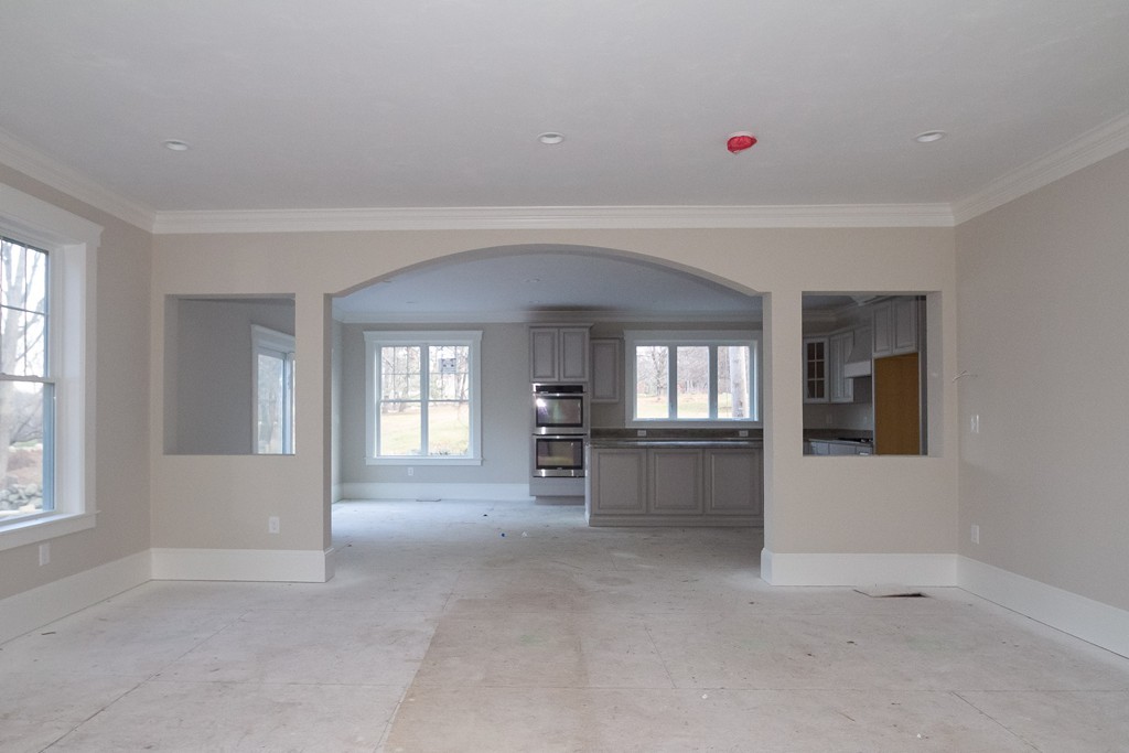 27 Birch Road Littleton, MA 01460 - Photo 10 of 22 a view of a livingroom with a furniture washer and dryer