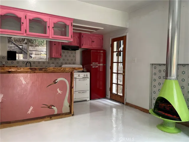 a bed room with a bed and cabinets