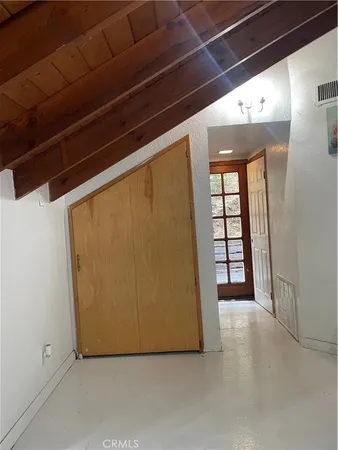 a front view of a house with glass windows