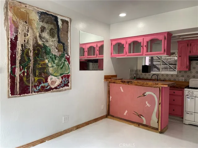 a room with lots of different colored cloths