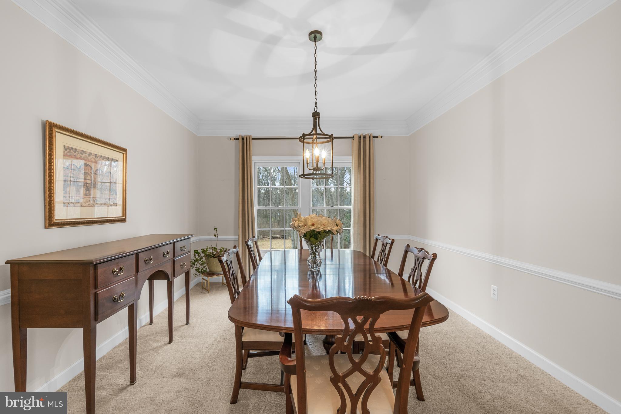 4615 Brightwood Road Olney, MD 20832 - Photo 15 of 45 a view of a dining room with furniture window and outside view