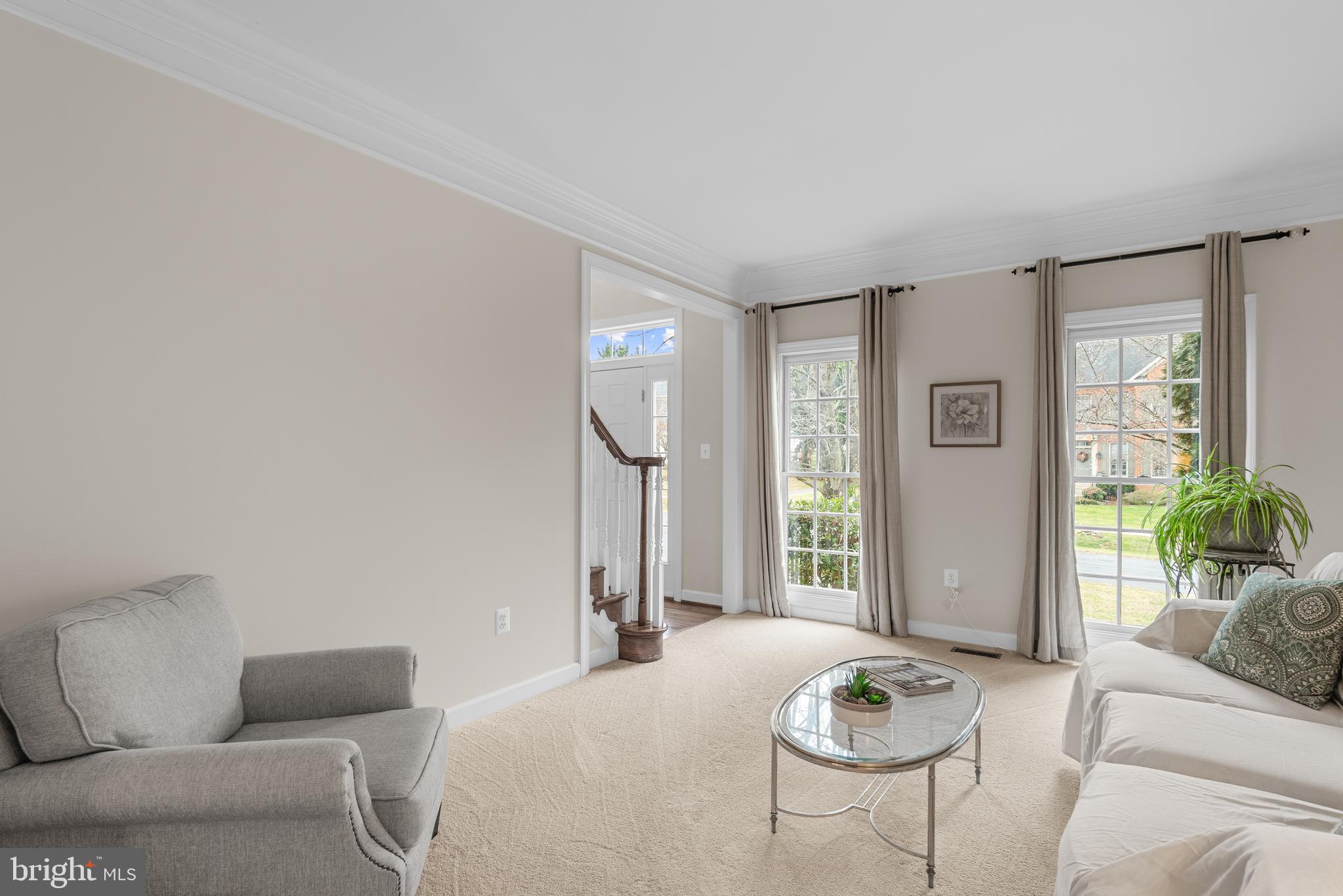 4615 Brightwood Road Olney, MD 20832 - Photo 17 of 45 a bedroom with furniture and a window