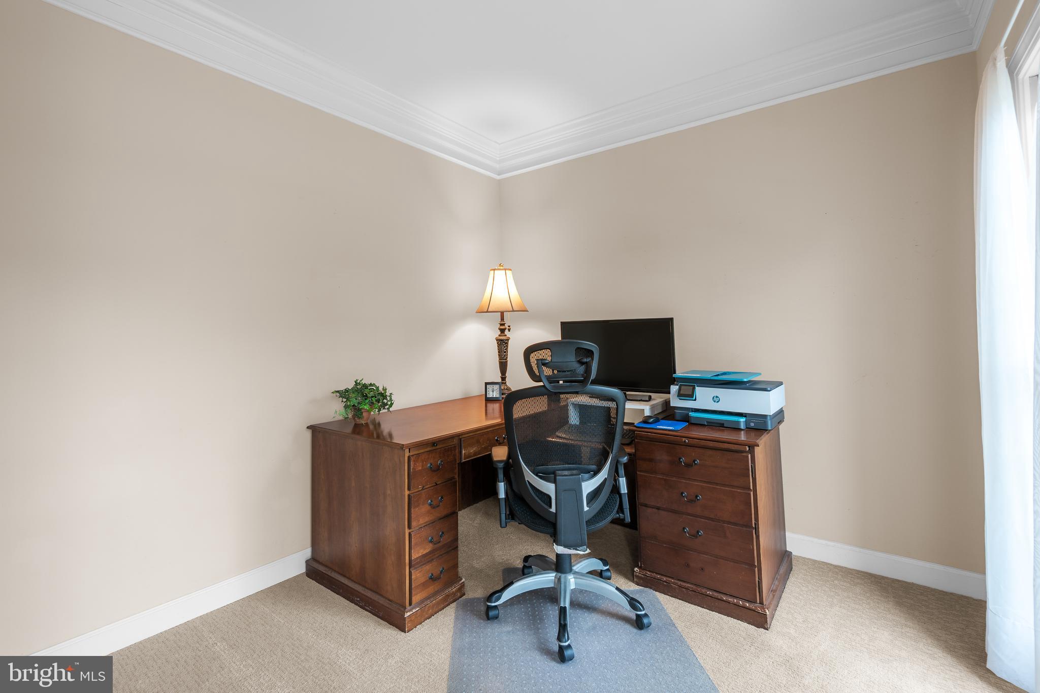 4615 Brightwood Road Olney, MD 20832 - Photo 2 of 45 a view of a workspace with furniture