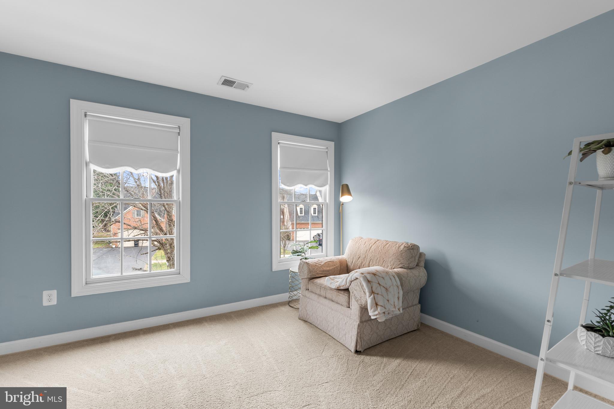 4615 Brightwood Road Olney, MD 20832 - Photo 23 of 45 a room with furniture and window