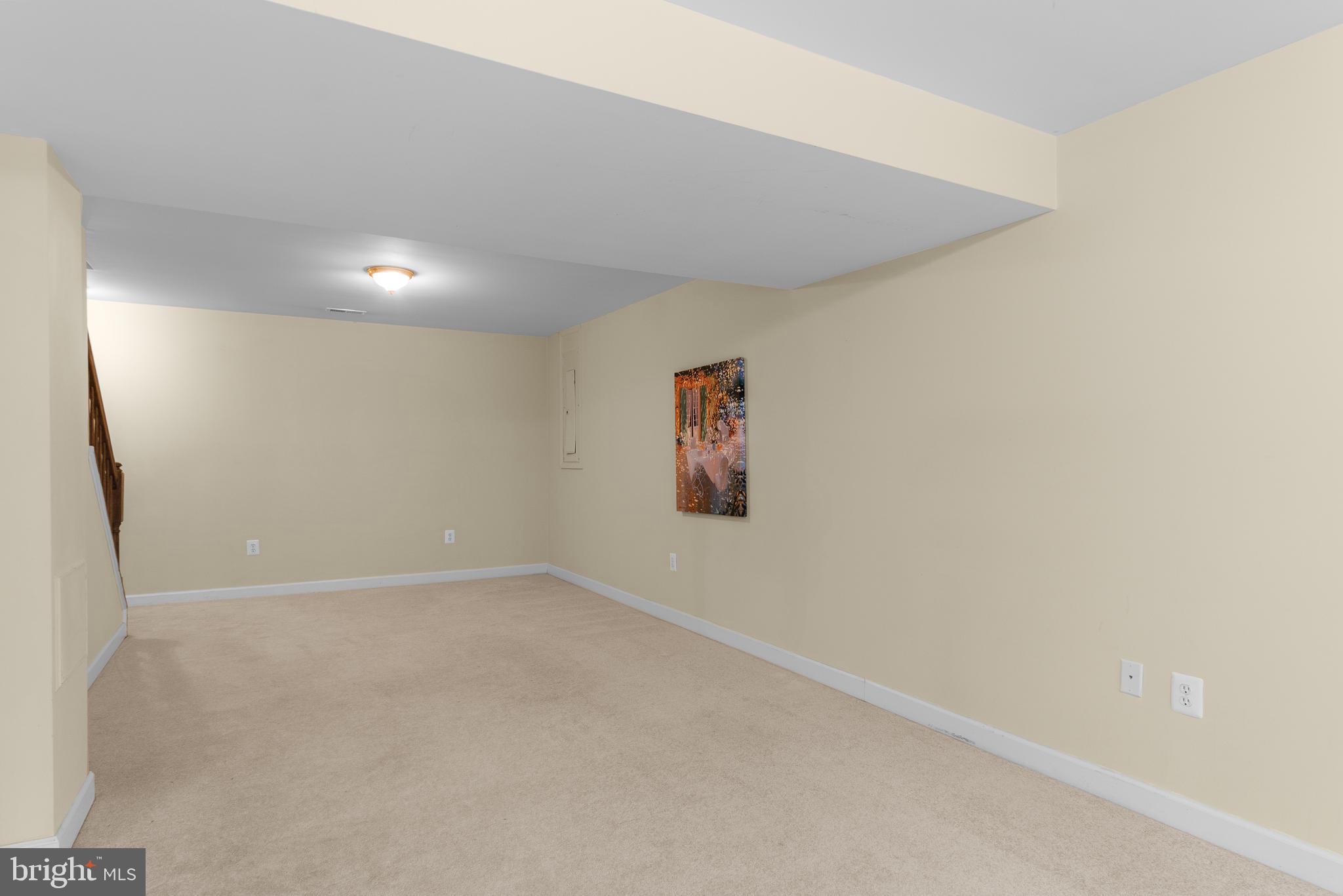 4615 Brightwood Road Olney, MD 20832 - Photo 35 of 45 an empty room with windows