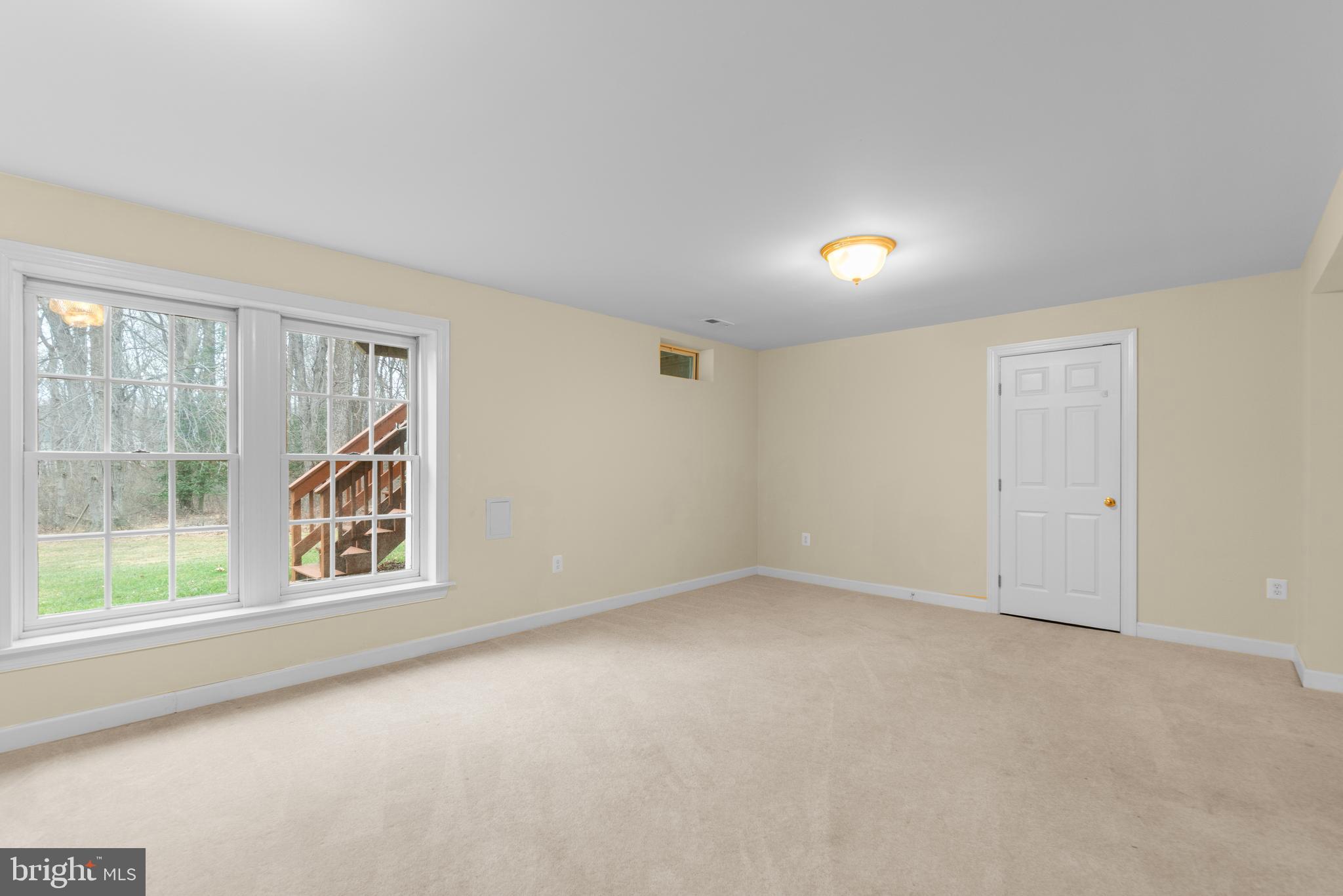 4615 Brightwood Road Olney, MD 20832 - Photo 37 of 45 a view of an empty room with a window