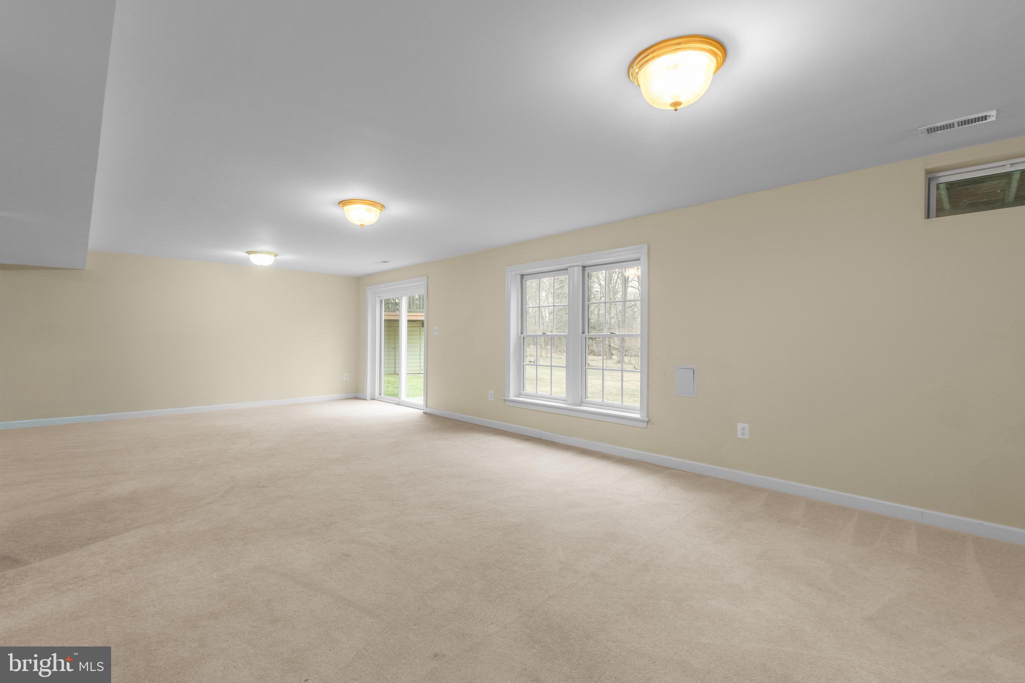 4615 Brightwood Road Olney, MD 20832 - Photo 39 of 45 an empty room with a window