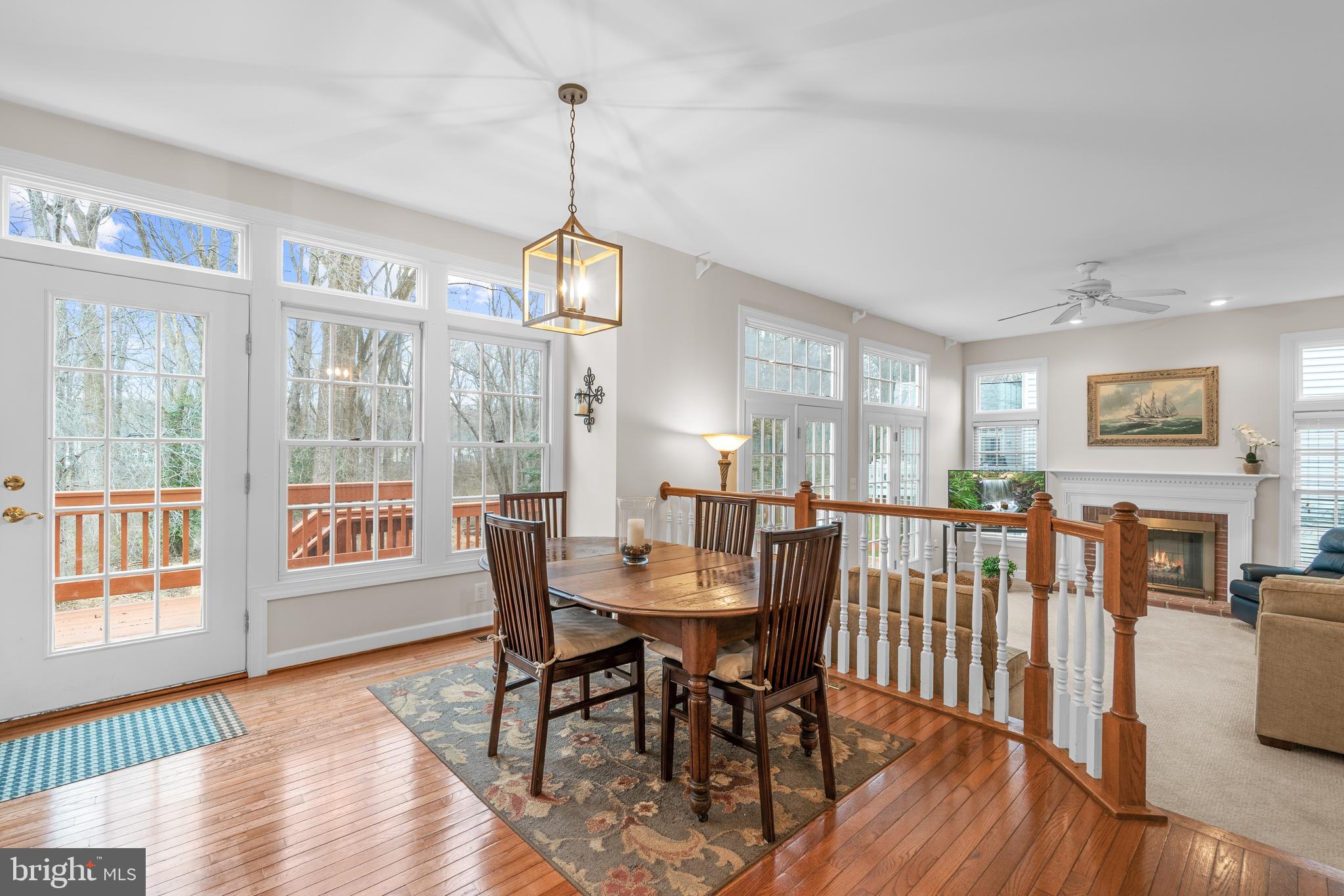 4615 Brightwood Road Olney, MD 20832 - Photo 9 of 45 a view of a dining room with furniture window and wooden floor