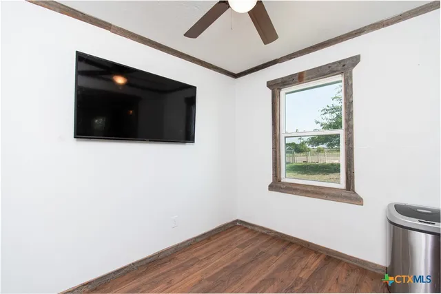 a kitchen with stainless steel appliances granite countertop a sink a stove and cabinets