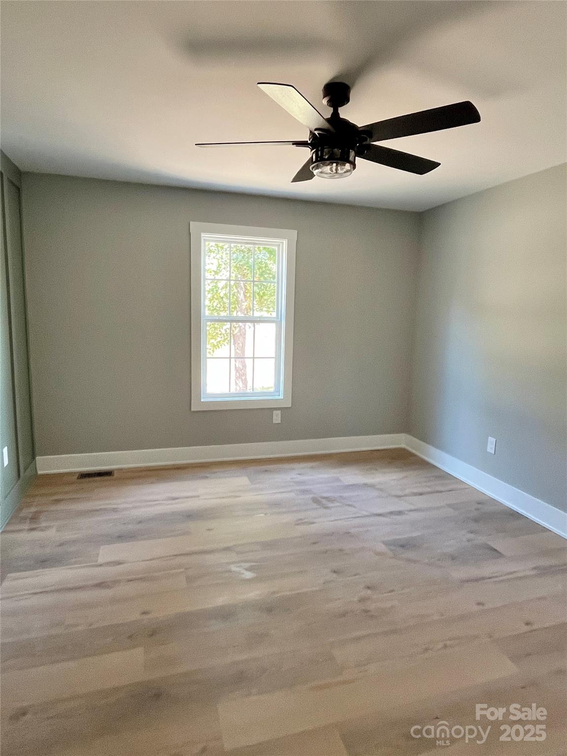 6255 Old Salisbury Road Linwood, NC 27299 - Photo 12 of 21 a view of an empty room with a window
