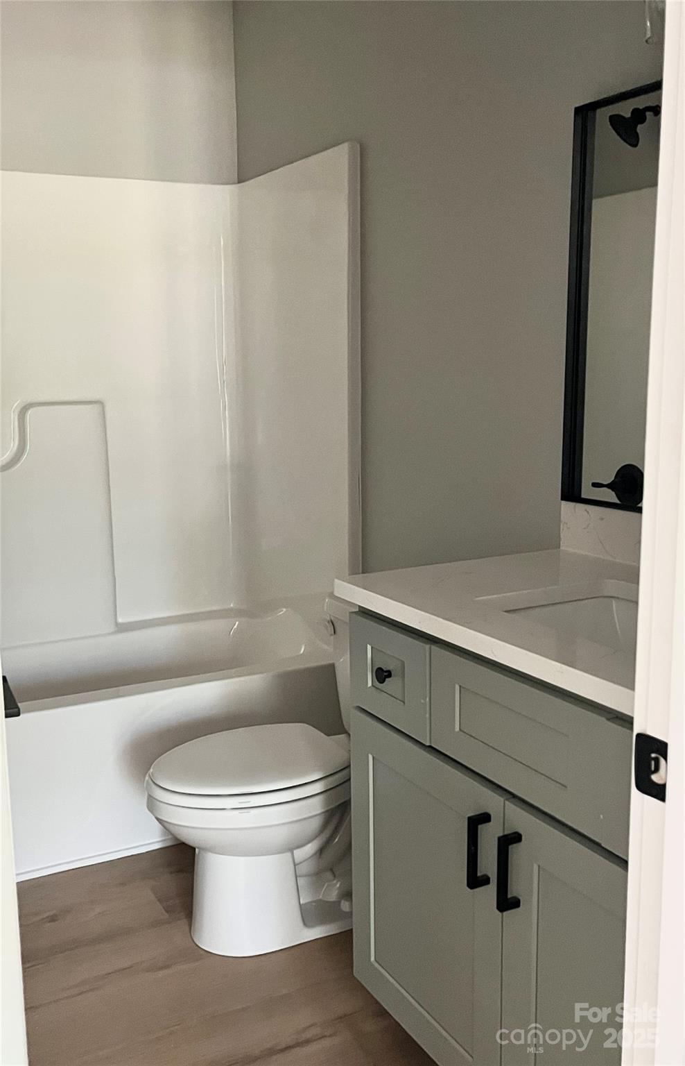 6255 Old Salisbury Road Linwood, NC 27299 - Photo 15 of 21 a white toilet sitting next to a bathroom sink