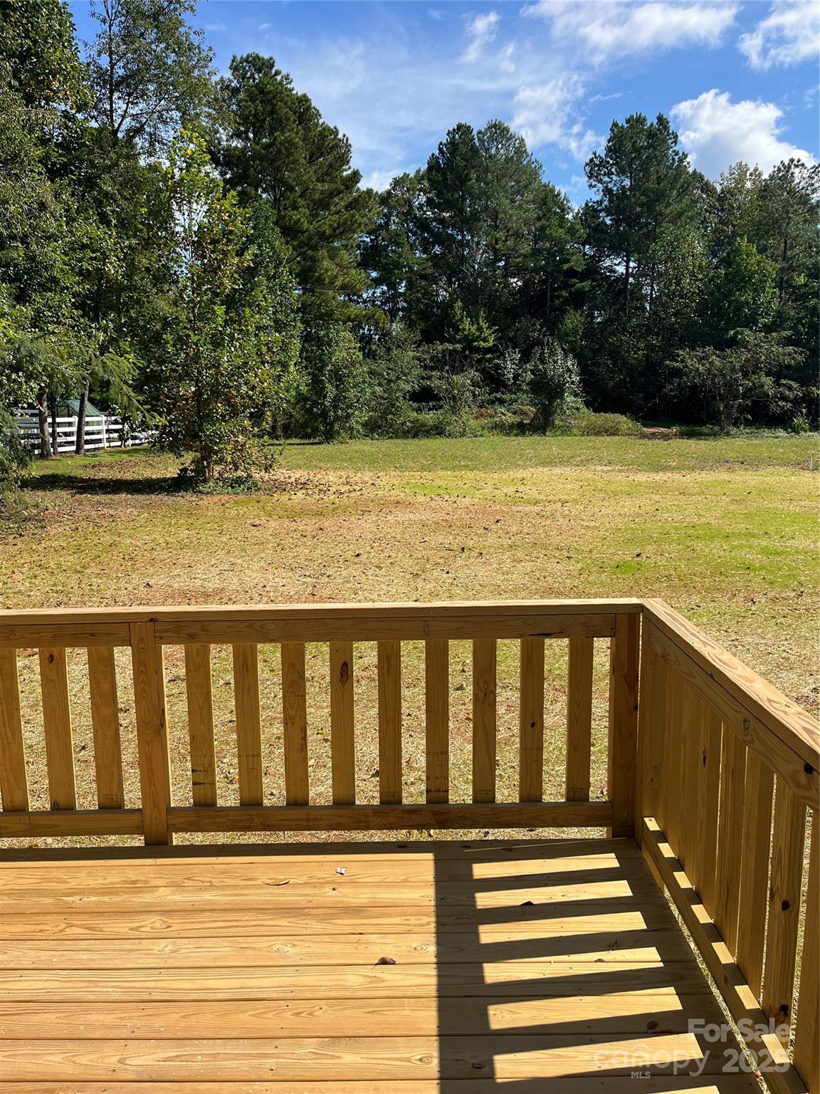 6255 Old Salisbury Road Linwood, NC 27299 - Photo 18 of 21 a view of a balcony with wooden floor