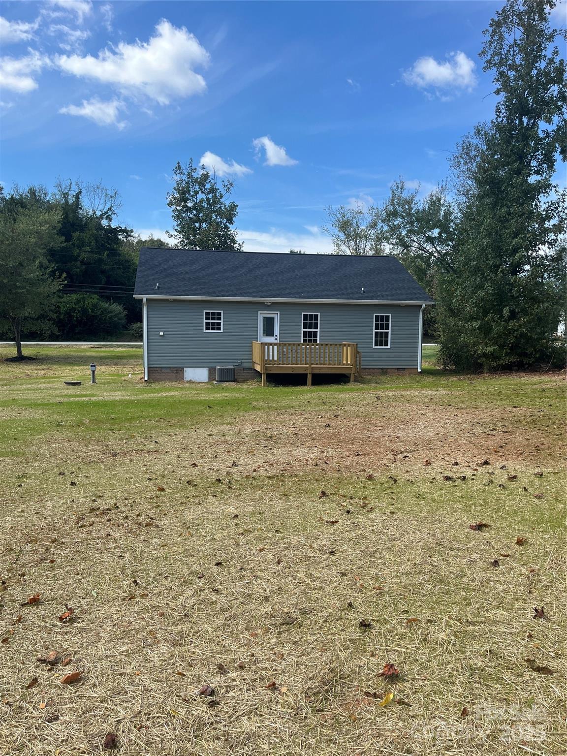 6255 Old Salisbury Road Linwood, NC 27299 - Photo 20 of 21 a house with a yard