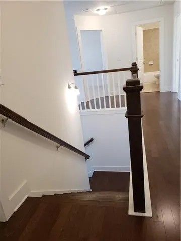 a view of entryway with wooden floor