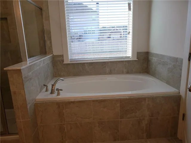 a bathroom with a bathtub
